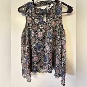 BB Dakota sheer fully lined  ruffled sleeveless top with key hole back